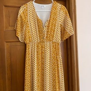 Mustard Wren and Ivory maxi dress.